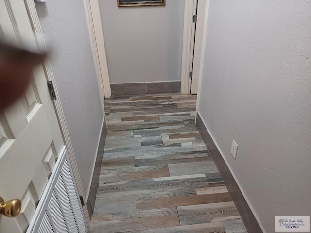 hall featuring dark hardwood / wood-style floors