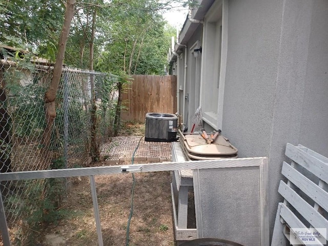 view of patio featuring central AC