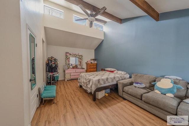 bedroom featuring beam ceiling, ceiling fan, and light hardwood / wood-style floors