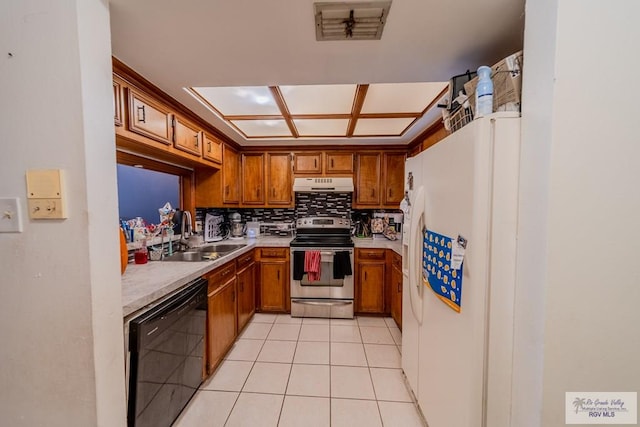 kitchen with backsplash, sink, white refrigerator with ice dispenser, dishwasher, and stainless steel stove