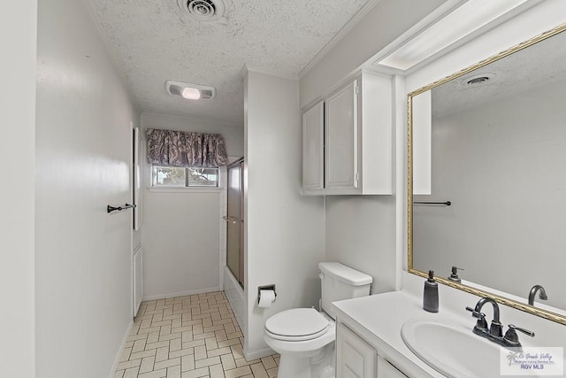 full bathroom with vanity, toilet, bath / shower combo with glass door, and a textured ceiling