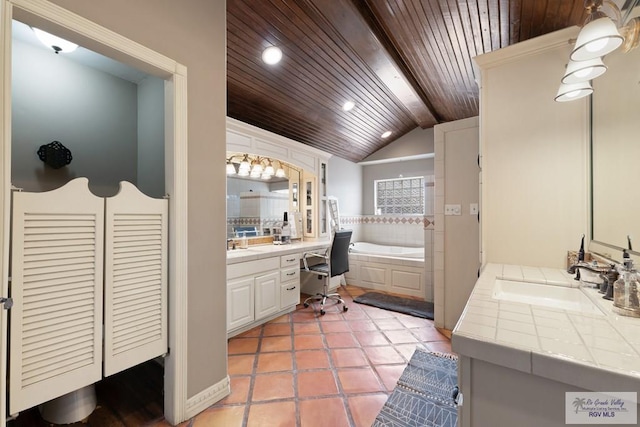 bathroom with vanity, vaulted ceiling, a bathtub, and wood ceiling