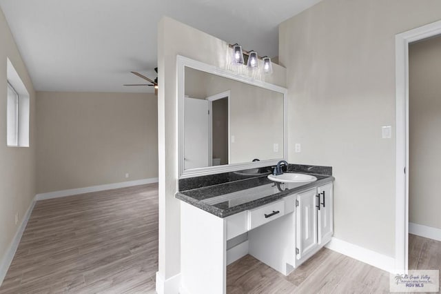 45 Varadero St, Brownsville, TX 78526 - bathroom with ceiling fan, vanity, wood finished floors, and baseboards