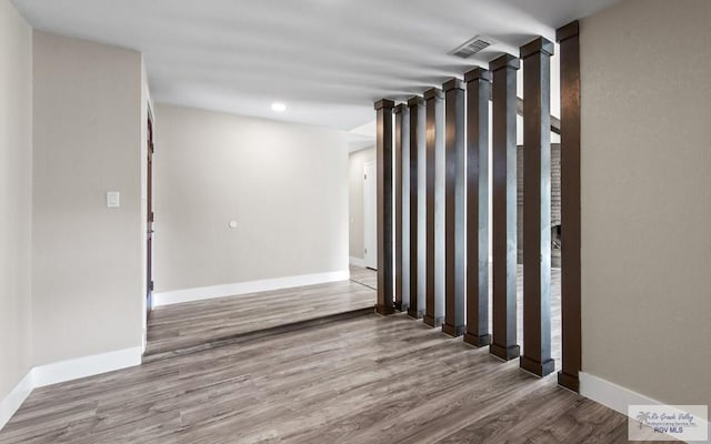 45 Varadero St, Brownsville, TX 78526 - empty room featuring wood finished floors, baseboards, and recessed lighting