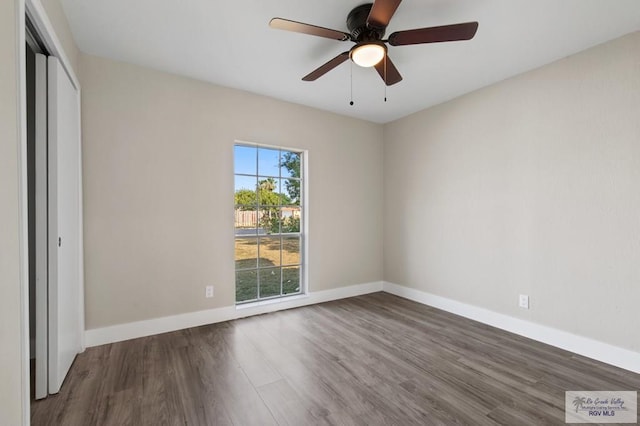 45 Varadero St, Brownsville, TX 78526 - unfurnished bedroom with wood finished floors, baseboards, a closet, and a ceiling fan