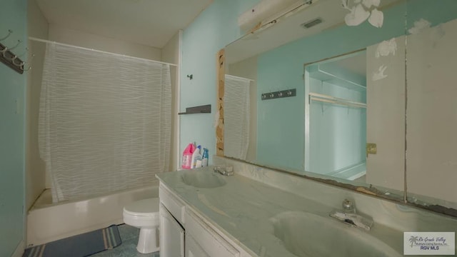 full bathroom with shower / tub combo, vanity, and toilet