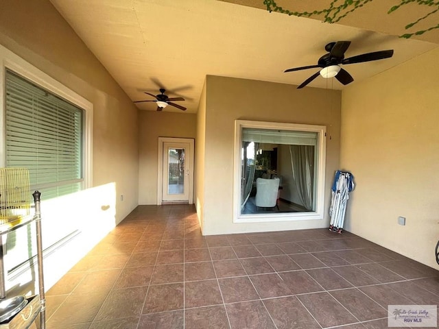 view of patio / terrace featuring ceiling fan