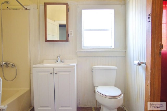 full bathroom featuring shower / bath combination, toilet, and vanity