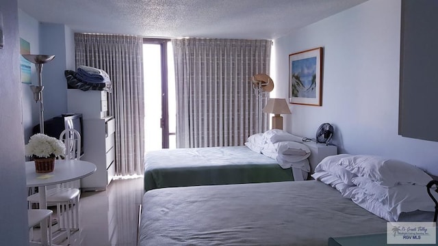 bedroom featuring a textured ceiling