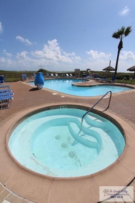 view of pool featuring a patio area