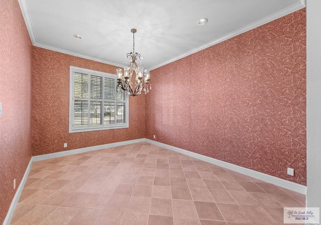 spare room with a notable chandelier and crown molding