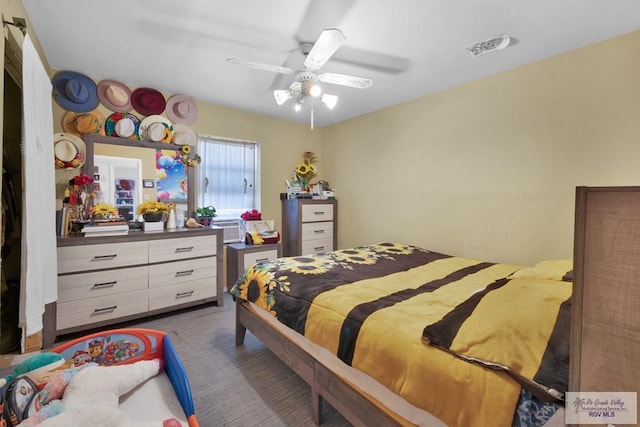 bedroom with carpet floors and a ceiling fan