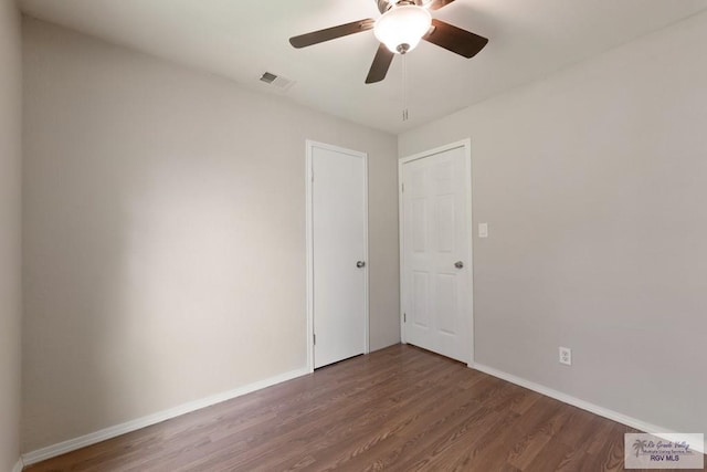 2310 W Arbor St, Harlingen, TX 78552 - spare room with wood finished floors, baseboards, and a ceiling fan