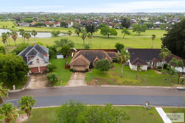 134 Camaguey Ave, Brownsville, TX 78526 - aerial perspective of suburban area featuring a large body of water