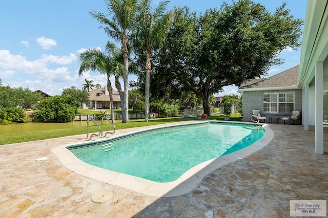 3406 Spyglass Hill Dr, Harlingen, TX 78550 - swimming pool with a patio and a lawn