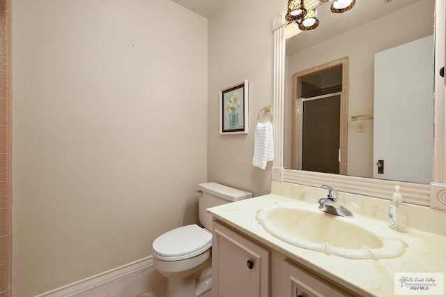 3406 Spyglass Hill Dr, Harlingen, TX 78550 - full bathroom with toilet, a stall shower, and vanity