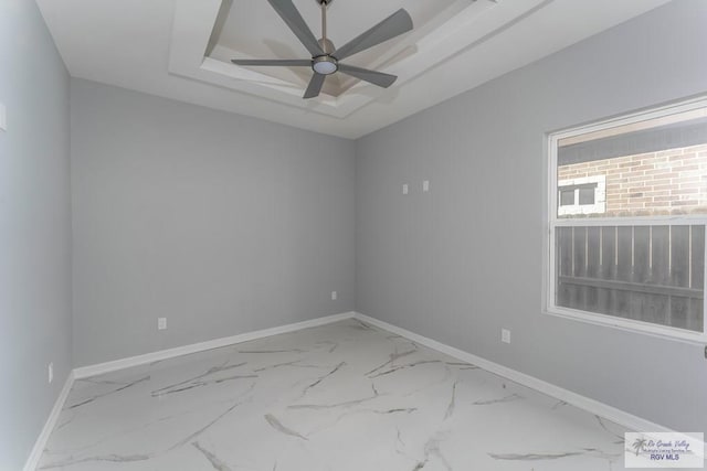 empty room featuring ceiling fan