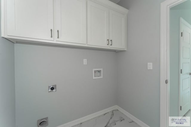 laundry area with cabinets, washer hookup, and hookup for an electric dryer