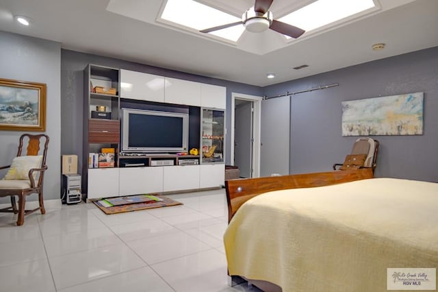 bedroom featuring ceiling fan and light tile patterned flooring