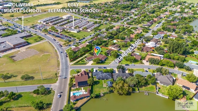 drone / aerial view featuring a water view