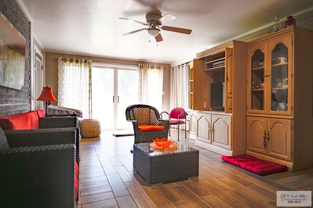 interior space featuring hardwood / wood-style flooring and ceiling fan