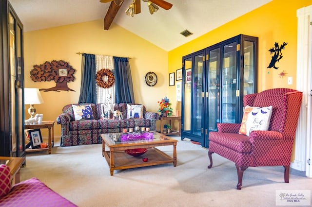 living room with carpet flooring, ceiling fan, and lofted ceiling with beams