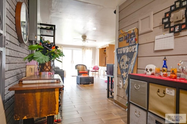 interior space with light hardwood / wood-style floors and ceiling fan