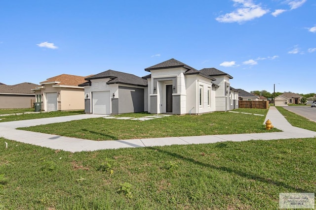 9718 Alexis Ave, Harlingen, TX 78550 - prairie-style home featuring concrete driveway, stucco siding, a residential view, a front yard, and a garage