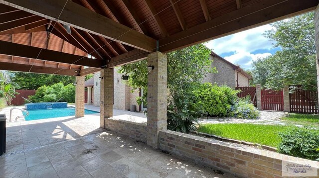 5443 Autumn Mist Ln, Brownsville, TX 78526 - view of patio / terrace with a gazebo and a gate