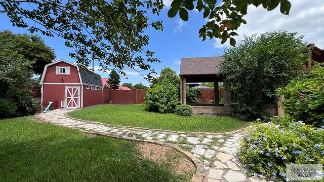 5443 Autumn Mist Ln, Brownsville, TX 78526 - view of yard with a barn and an outdoor structure