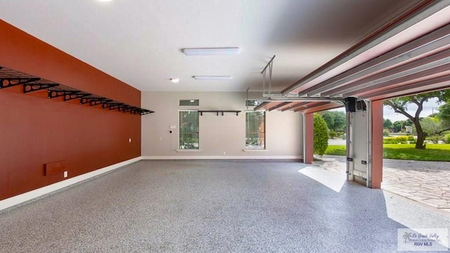 5443 Autumn Mist Ln, Brownsville, TX 78526 - garage featuring baseboards