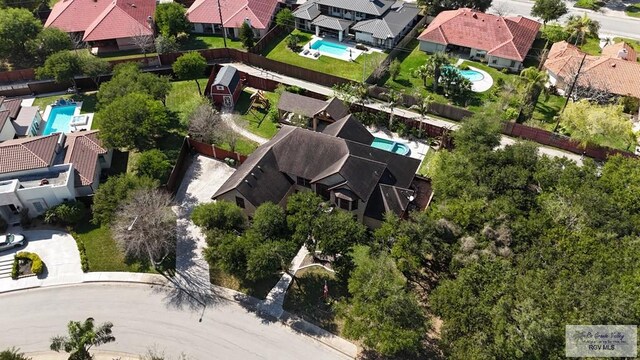 5443 Autumn Mist Ln, Brownsville, TX 78526 - aerial perspective of suburban area with a pool area
