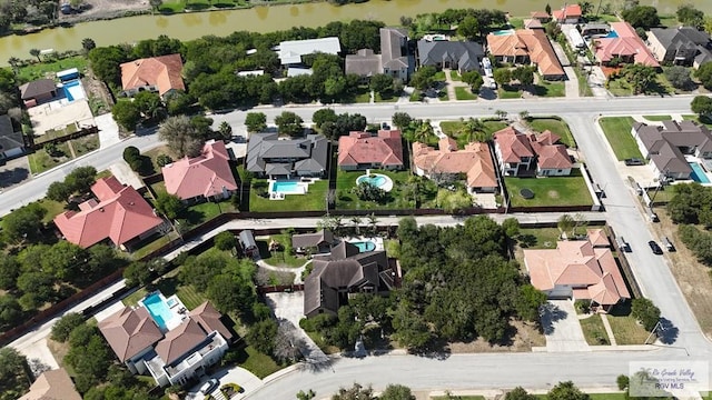 5443 Autumn Mist Ln, Brownsville, TX 78526 - aerial view of property's location with nearby suburban area and a nearby body of water
