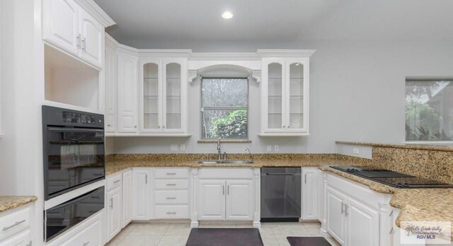 5443 Autumn Mist Ln, Brownsville, TX 78526 - kitchen with black appliances, a sink, a warming drawer, white cabinets, and recessed lighting