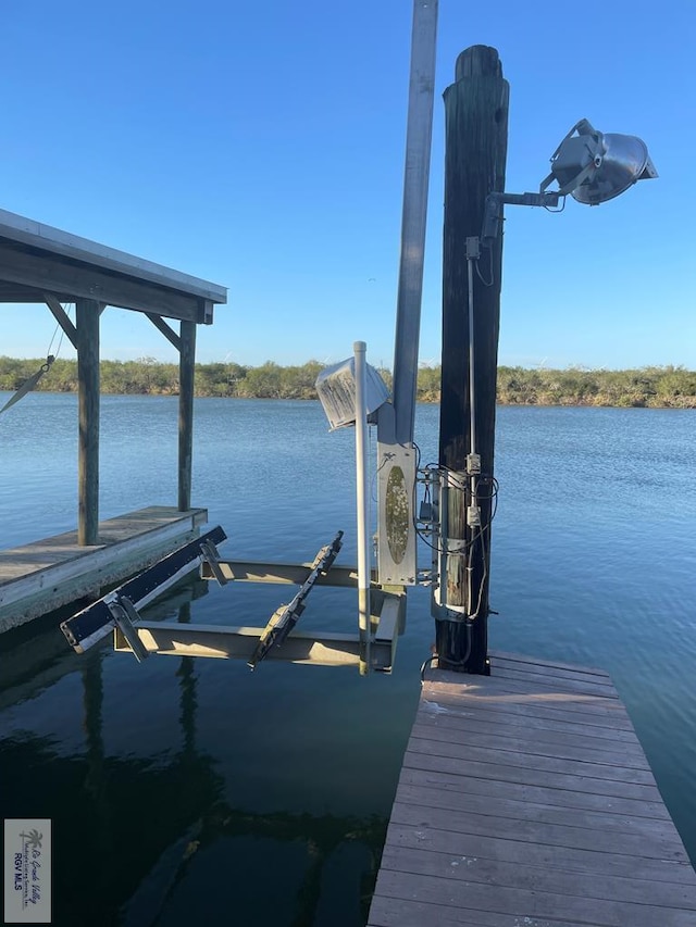 view of dock with a water view