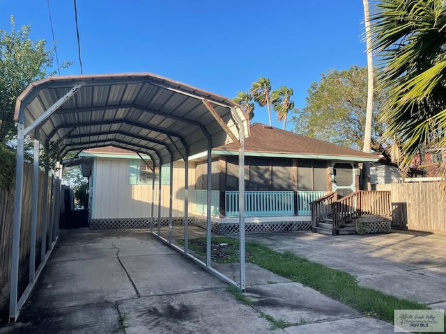 view of parking featuring a carport