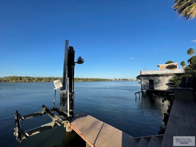 view of dock with a water view