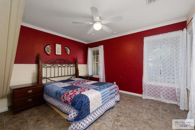 bedroom featuring ceiling fan and ornamental molding