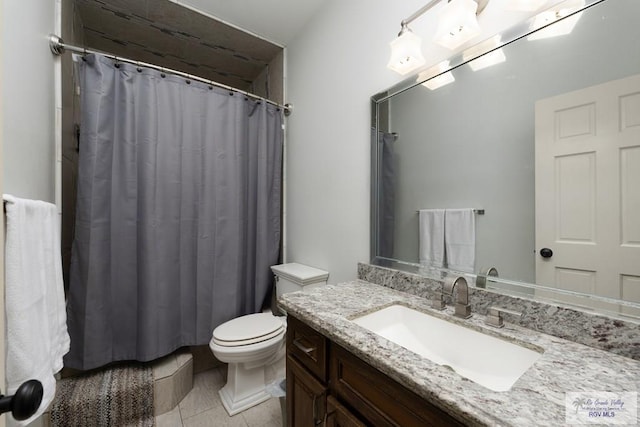 bathroom featuring tile patterned flooring, vanity, toilet, and a shower with curtain