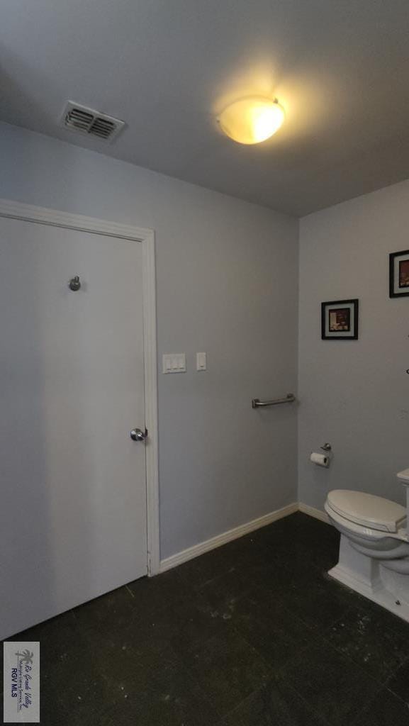 bathroom featuring toilet