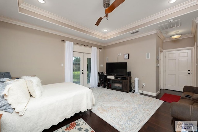 bedroom featuring access to exterior, ceiling fan, french doors, dark hardwood / wood-style flooring, and crown molding