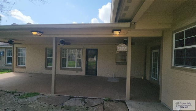 view of patio with ceiling fan