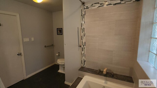 bathroom featuring toilet