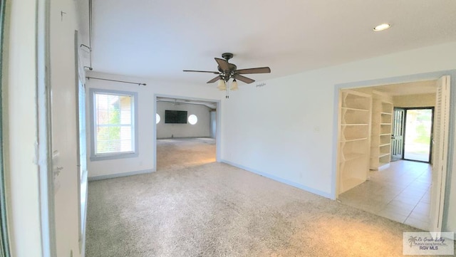 empty room with ceiling fan