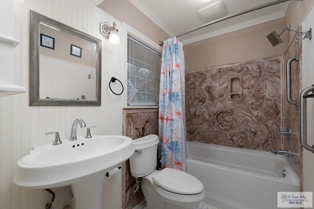 full bathroom featuring sink, toilet, and shower / bath combo