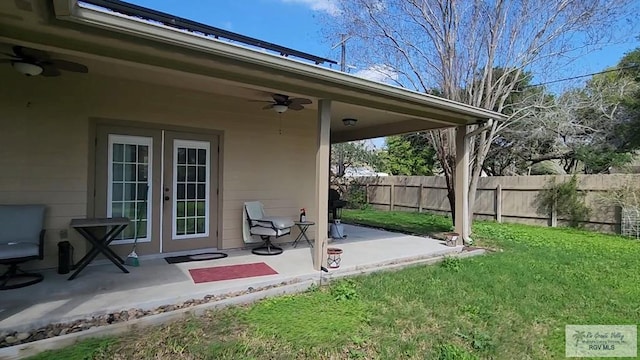 view of patio / terrace with french doors and ceiling fan