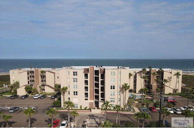 view of building exterior with a water view