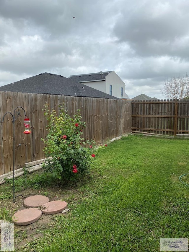 view of yard featuring a fenced backyard