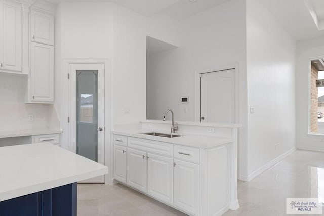 bathroom featuring tile patterned floors and sink