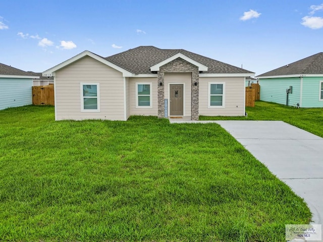 view of front of home with a front lawn